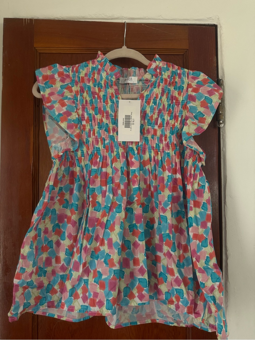 Avara Smocked Flutter-Sleeve Blouse